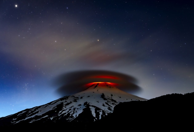 Earth and Sky by Francisco Negroni (Chile) Highly commended A double lenticular cloud is illuminated at nightfall by the lava emitted from the Villarrica volcano, Chile. Villarica is in the town of Pucón in the south of Chile. It’s one of the country’s most active volcanoes and last erupted in 2015. Francisco takes regular trips to Villarrica to monitor its activity. On this visit, he stayed nearby for 10 nights.