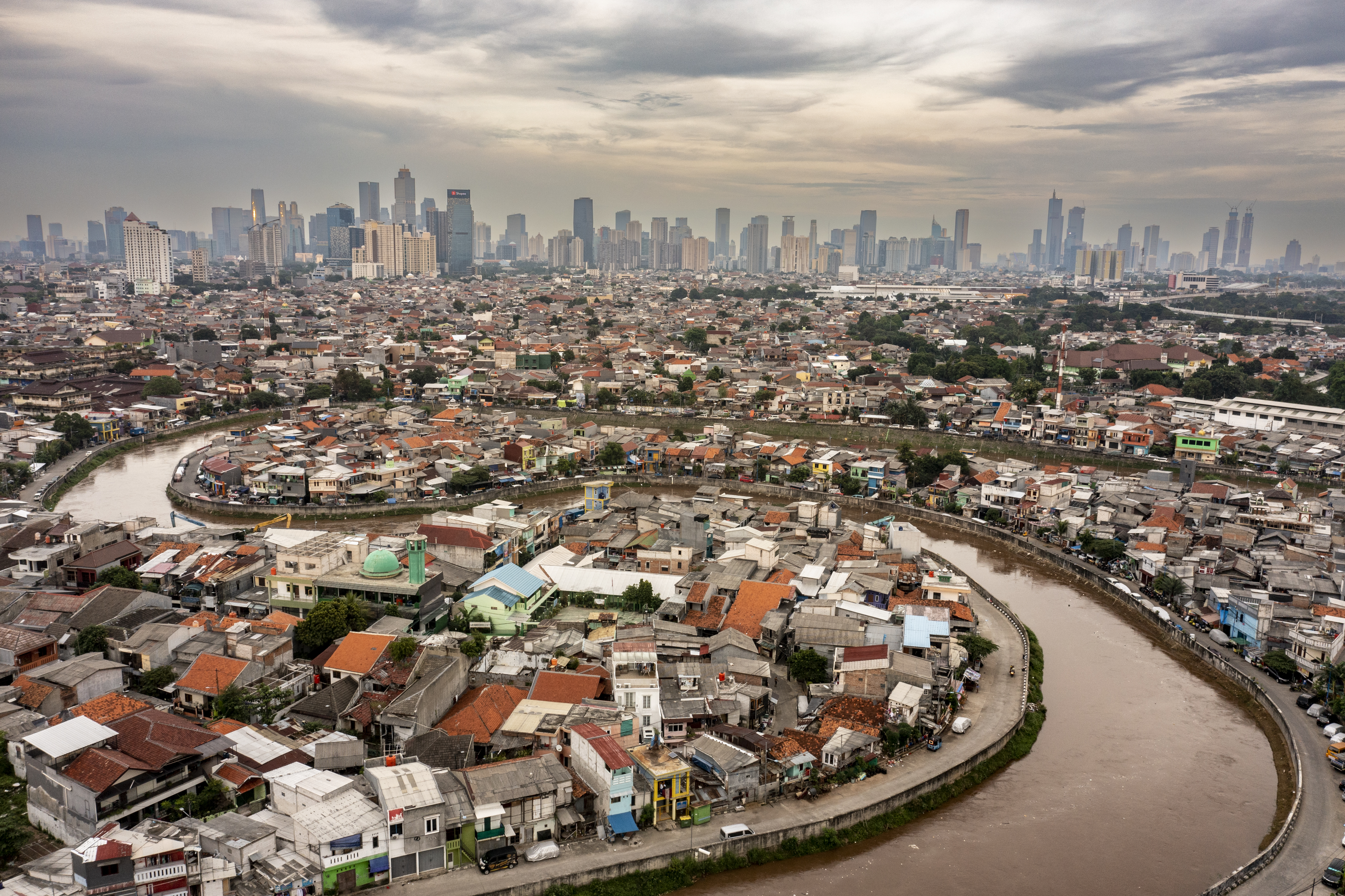 The dead river by Joan de la Malla, Spain Winner, Wetlands - The Bigger Picture Joan de la Malla provides a bird’s-eye view of the polluted Ciliwung river winding through Indonesia’s capital, Jakarta. To find a time when lower air pollution allowed a clear view, Joan returned to the scene over several days. His image documents one of the most polluted rivers in the world and illustrates the growing global issue of river pollution. DJI Mavic 2 Pro + Hasselblad L1D-20c + 28mm f2.8 lens; 1/25 at f6.3; ISO 100.