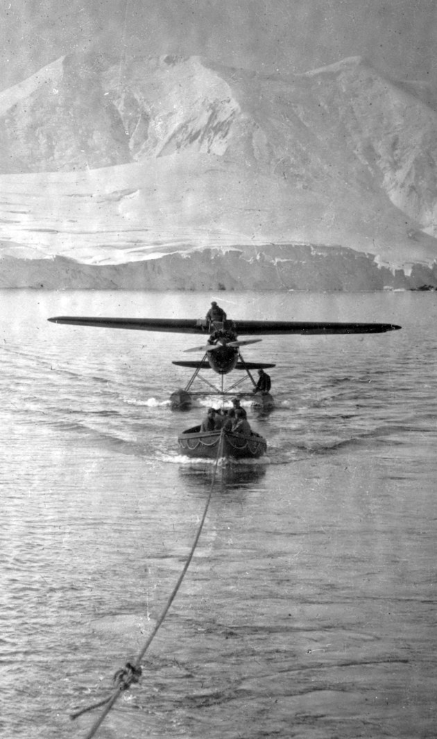 From the mid-1920s Wilkins made a series of flights to Antarctica. At the time, Wilkins’ goal was the circumnavigation of the ‘unknown’ continent for the purpose of setting up weather stations that he believed would measure changes in the air masses that governed the weather ten thousand miles away. Here, his Lockheed Vega monoplane prepares for take off from open water in Antarctica. Image courtesy the State Library of South Australia.
