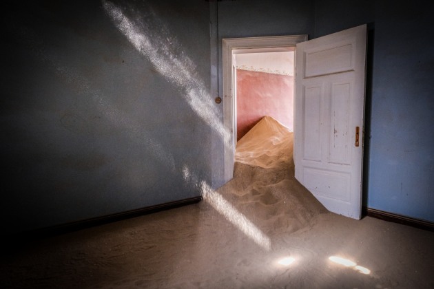 A handful of sand tossed into a beam of light was the perfect 'extra' to add to this image of the ghost town of Kolmanskop, Namibia. Fujifilm X-T2, 10-24mm f/4 lens @ 14mm. 1/50s @ f4, ISO 2500.