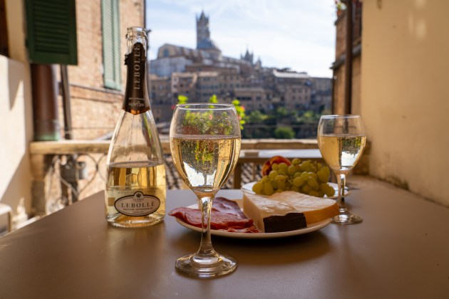 Adding interest is key. The medieval city of Siena, Italy adds a huge amount of interest as the backdrop for what would otherwise be an average food photo. Sony A7R IV, 24-105mm f/4 lens @ 27mm. 1/160s @ f8, ISO 100.