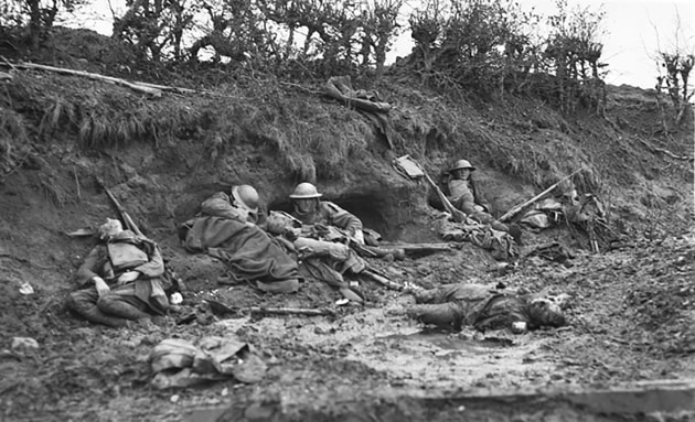 The horrors of World War I. Here, dead and wounded Australians and Germans lie in the railway cutting in the Ypres sector, Belgium, during the battle of Passchendaele. It is not certain who took this image but other images indicate that both Wilkins and famed Australian photographer Frank Hurley were present at the time it was taken, with Wilkins claiming it as one of his own. In time, the image has become one of his most famous pictures from the Great War.