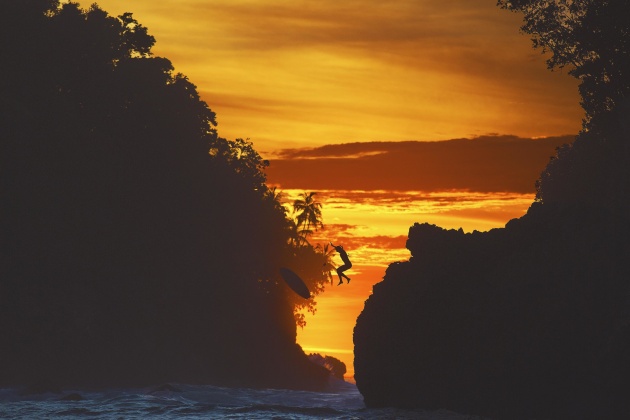 We were staying on an island near by in the Mentawai Islands, Indonesia, when I noticed one afternoon that from boat we could shoot between the islands and shoot with the sun. Raine, a mate of mine, scaled the rocks and jumped off at the perfect time just as the sun was setting. Canon 5D Mark III, EF70-200mm f/2.8L IS II USM lens @ 200mm. 1/3200s @ f4, ISO 400.