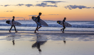 One frame: Surfers at sunset