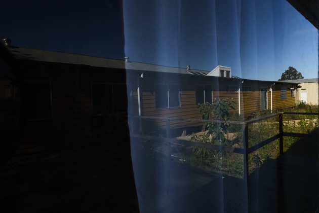 The little boy’s dormitory captured in the reflection of a window.
“This place… we were just little slaves.” Uncle Ian ‘Crow’ Lowe #41.
Image: Tace Stevens for Magnum Foundation & World Monuments Fund.