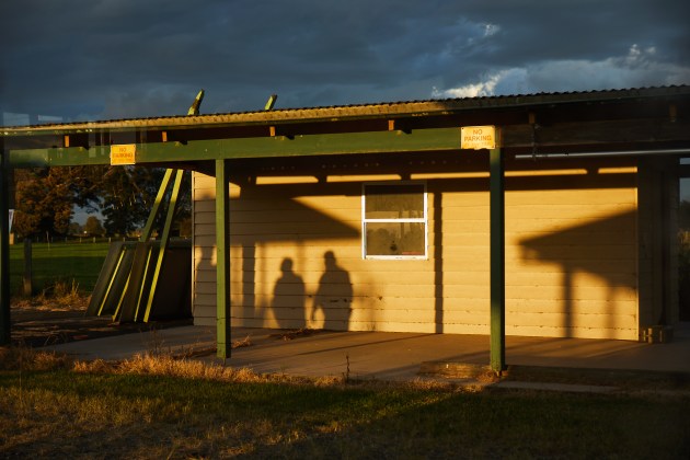 During a site tour, two shadows are captured on a building built after KBH closed.
“They drove me down to Kinchela. Came to the gates. Lost my identity, my culture, stayed on the other side. When I come through that gate, Roger Jarret stayed the other side. I became number 12 for six years in this place.” Uncle Roger ‘Pigeon’ Jarrett #12. Image: Tace Stevens for Magnum Foundation & World Monuments Fund