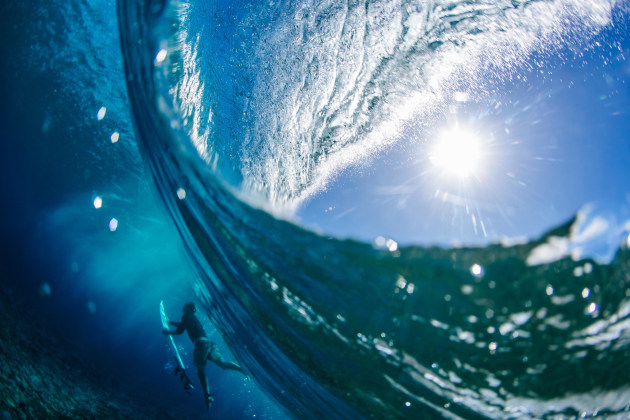 Taken at the Tahiti Pro Teahupo’o - WSL Championship Tour 2019, this duck-diving shot is one I have dreamt of for years. I shot with a big dome port to allow the clear water in the wave to wrap around the port and see the duck dive beneath the surface. This is a very difficult shot to nail, and I haven’t pulled off many like this. It was a finalist in the 2019 Surf photographer of the Year awards. Canon 1D X Mark II, EF15mm f/2.8 Fisheye lens. 1/1000s @ f7.1, ISO 250.